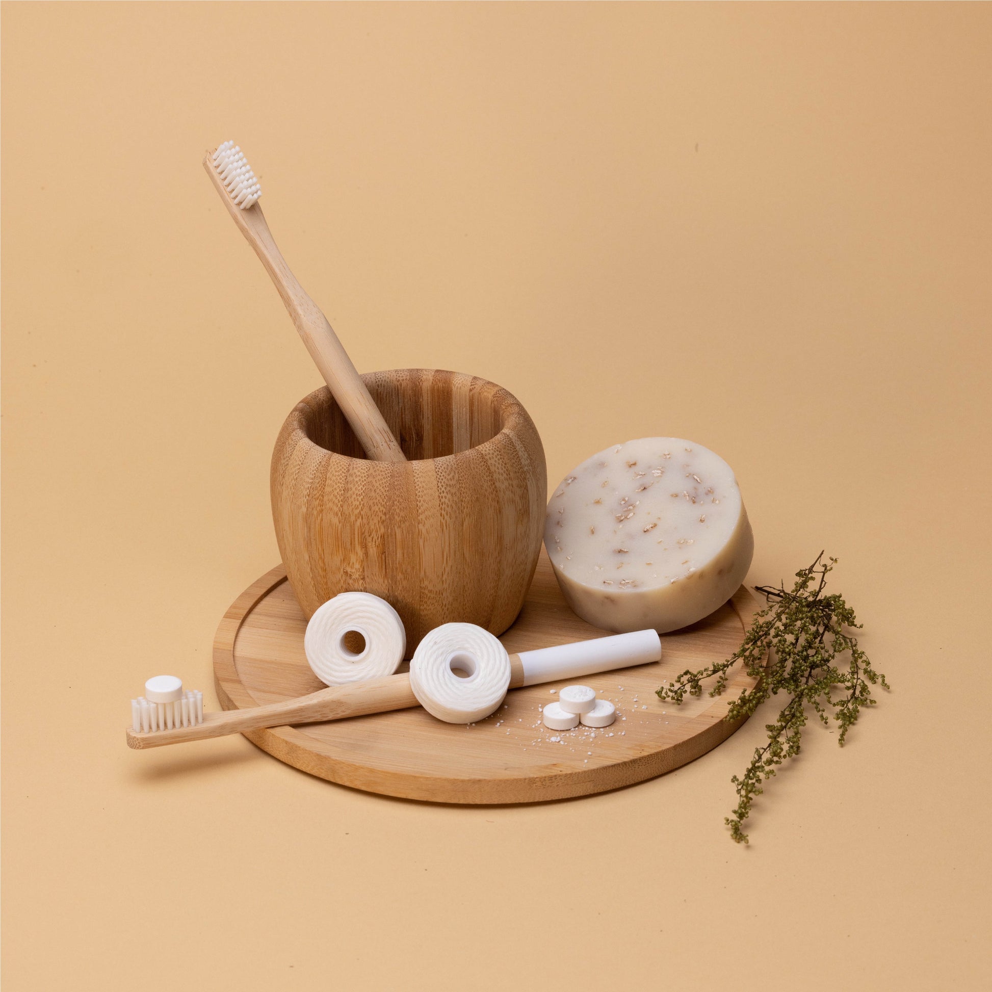 Sustainable Dental Kit with biodegradable bamboo toothbrushes and floss, right angle