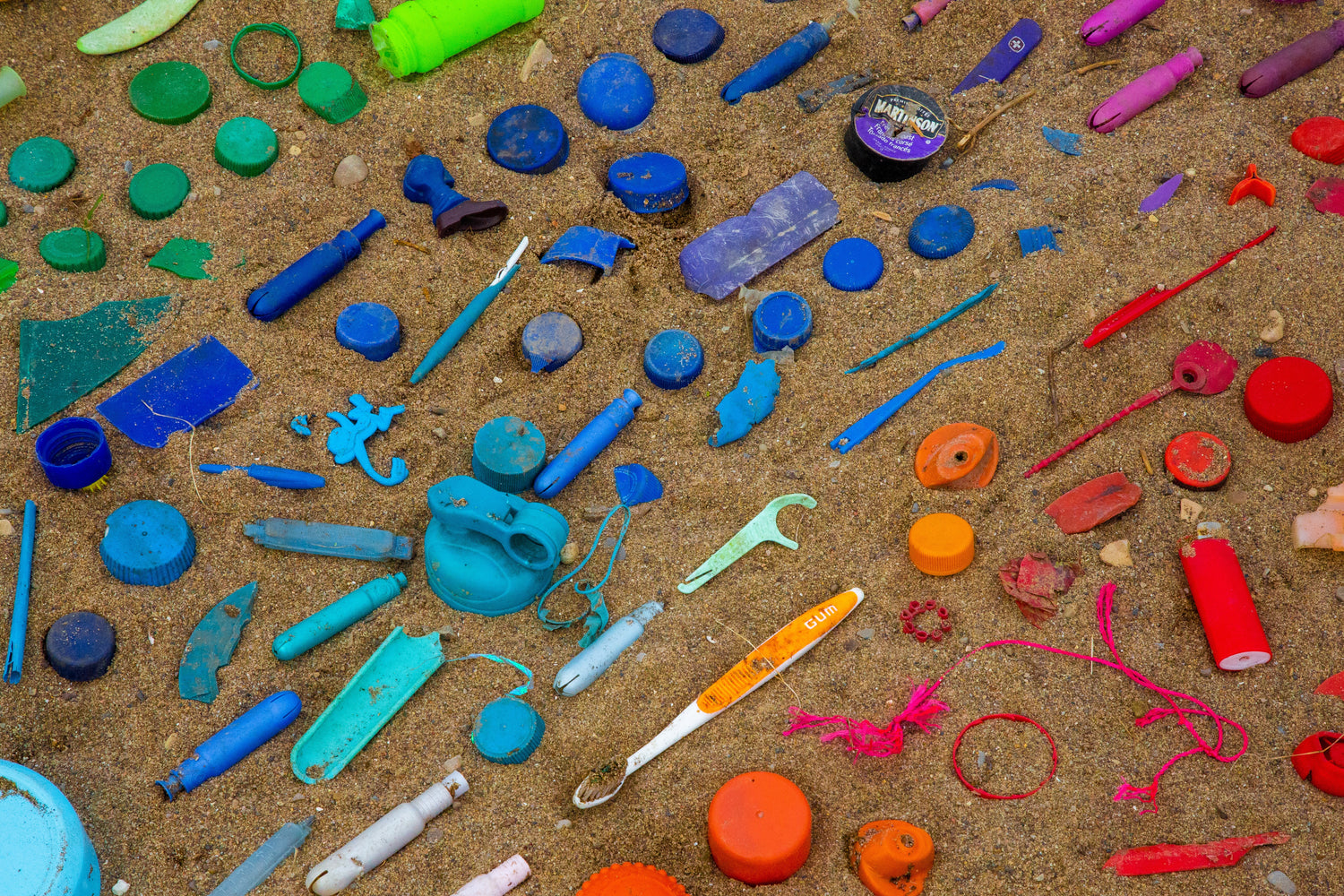 plastic waste on sand